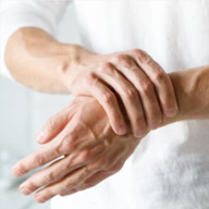 sore hand representing chronic pain