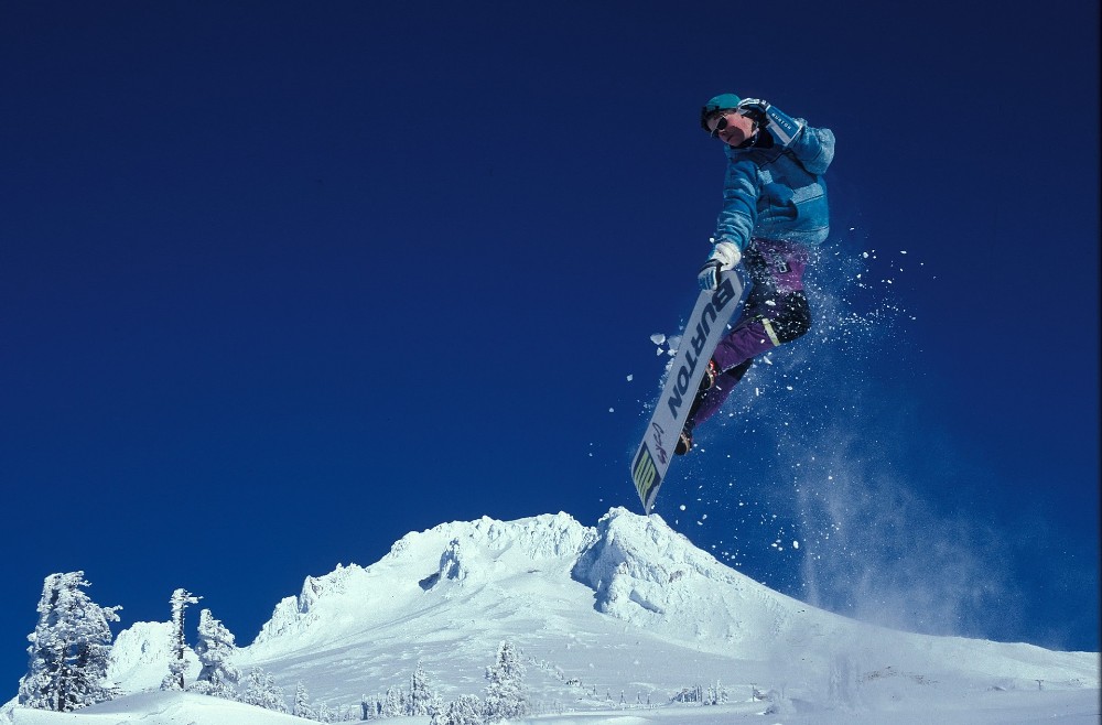 person snowboarding with peak performance
